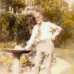 Reginald Pelham Bolton standing in the "community garden" behind his home on West 158th Street, circa 1938